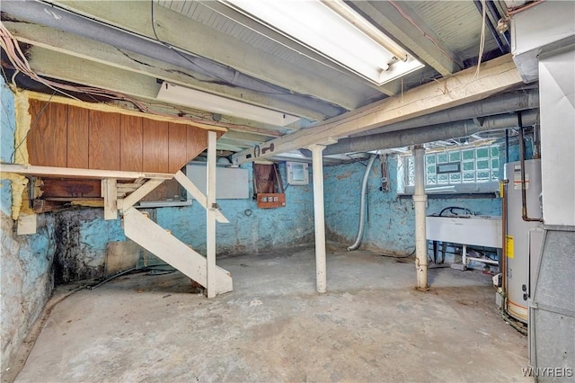 basement with sink and gas water heater