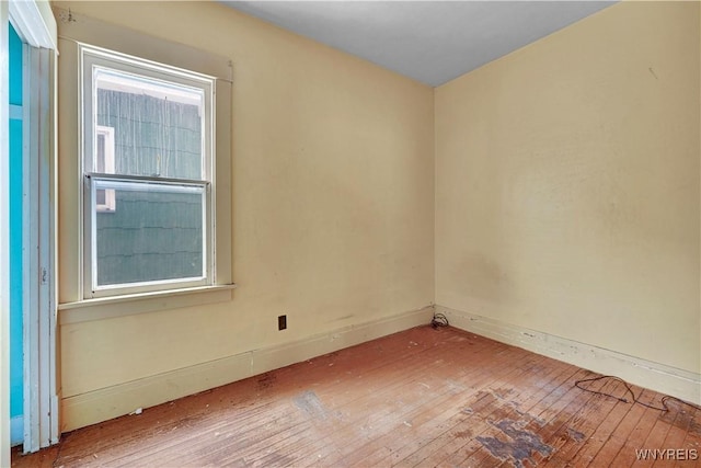 empty room featuring hardwood / wood-style flooring