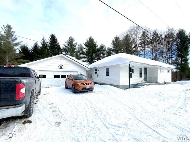 single story home featuring a garage