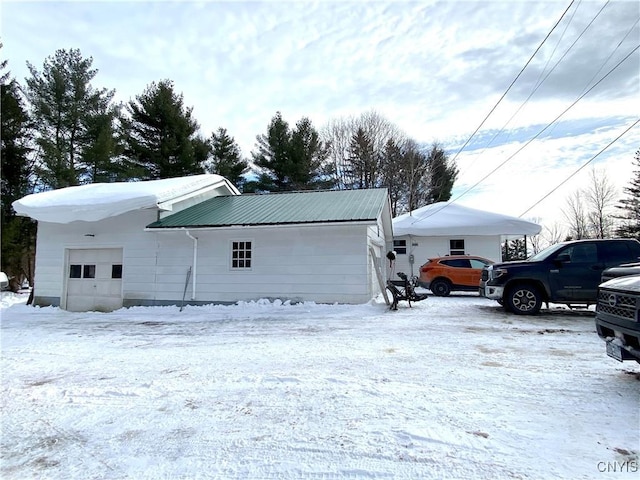 exterior space with a garage