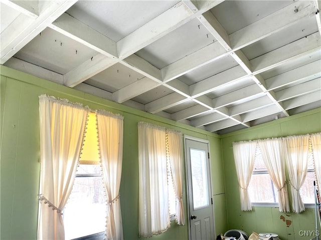 room details featuring coffered ceiling and beam ceiling