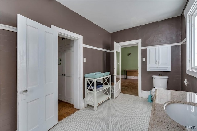 bathroom with toilet and sink