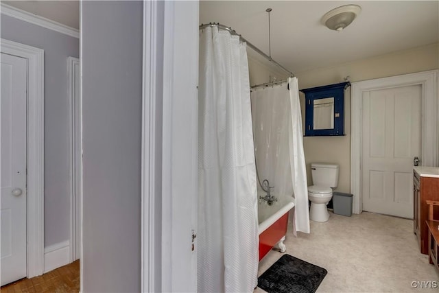 full bathroom with ornamental molding, vanity, shower / tub combo with curtain, and toilet