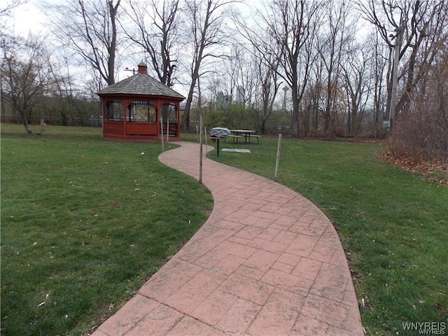 view of home's community with a gazebo and a lawn