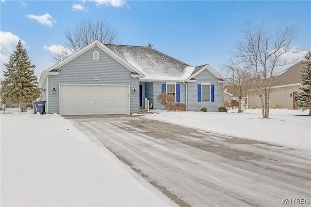 single story home with a garage