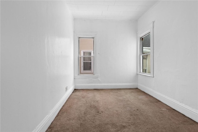 unfurnished room featuring carpet floors