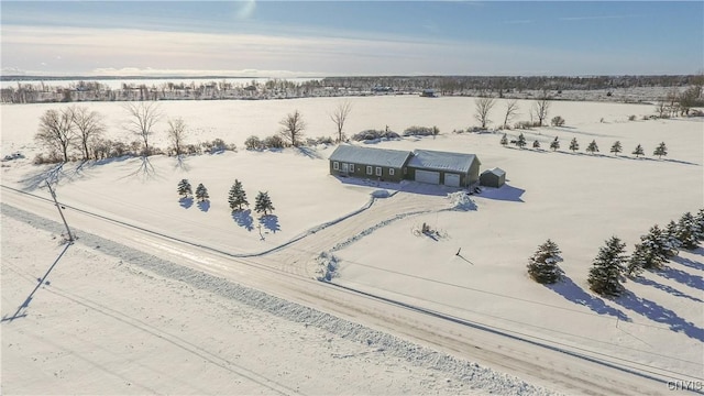 snowy aerial view with a rural view