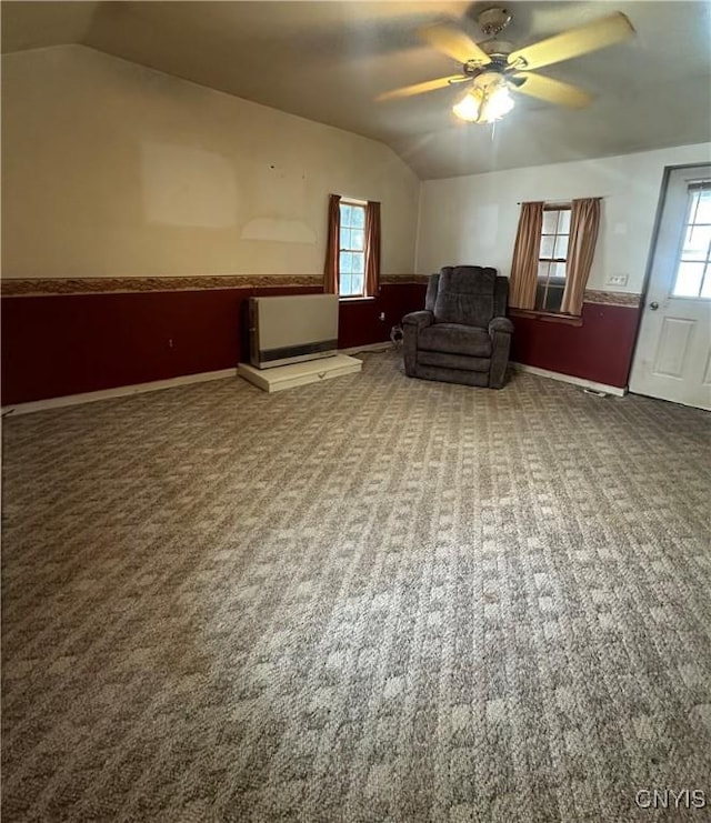 32458 County Route 54, Clayton, NY 13632 - unfurnished room featuring carpet floors, a healthy amount of sunlight, and vaulted ceiling