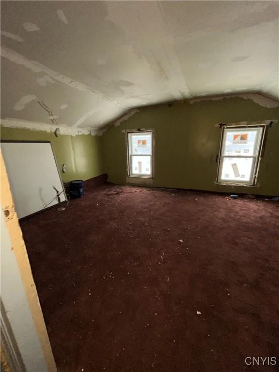 bonus room with vaulted ceiling