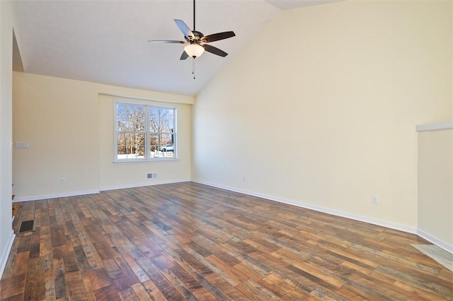 empty room with dark hardwood / wood-style flooring, high vaulted ceiling, and ceiling fan