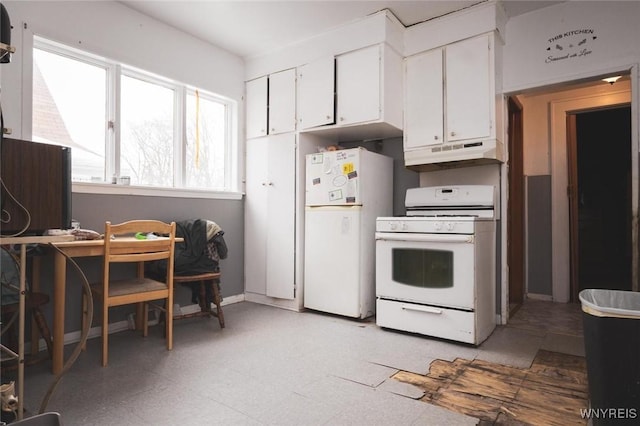 kitchen featuring white cabinets and white appliances