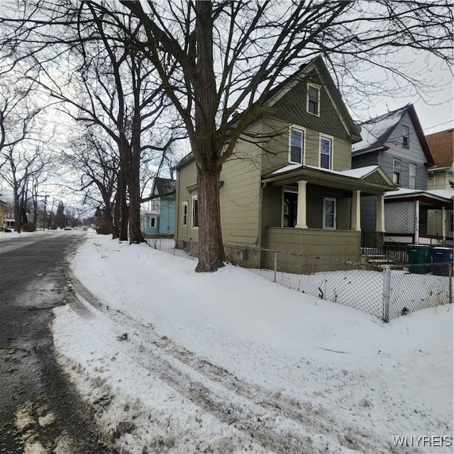 view of snow covered property