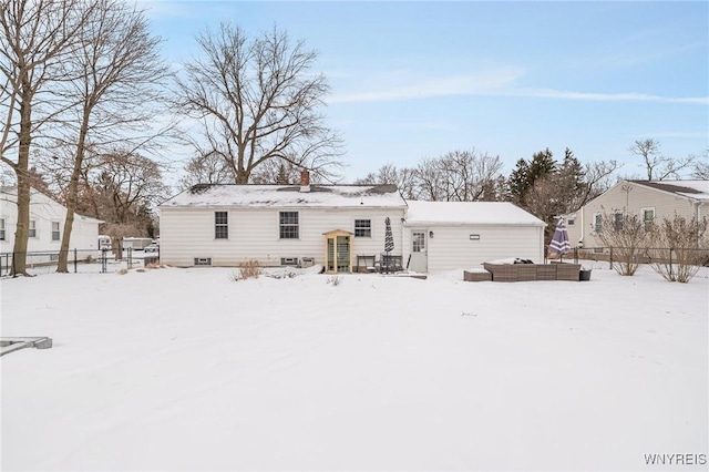 view of snow covered house