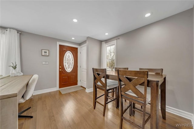 dining room with light hardwood / wood-style floors