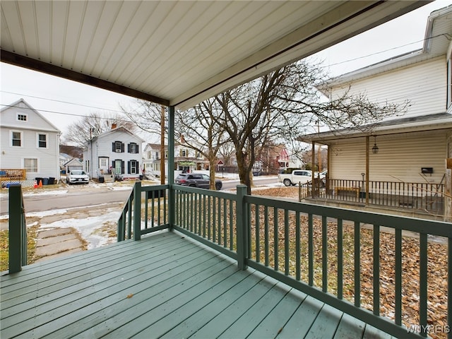 wooden terrace featuring a porch