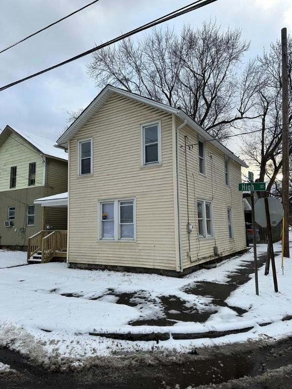 view of snow covered property