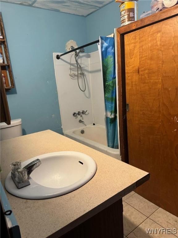 bathroom with tile patterned flooring, shower / tub combo with curtain, and vanity