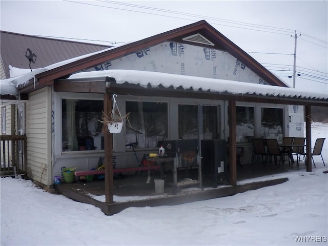 view of snow covered property