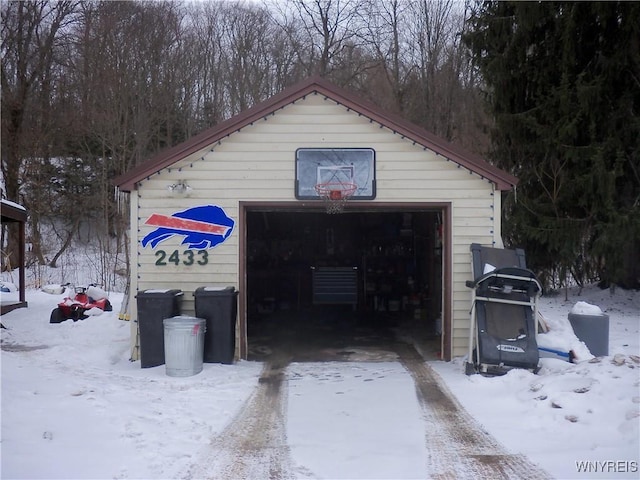 view of snow covered garage