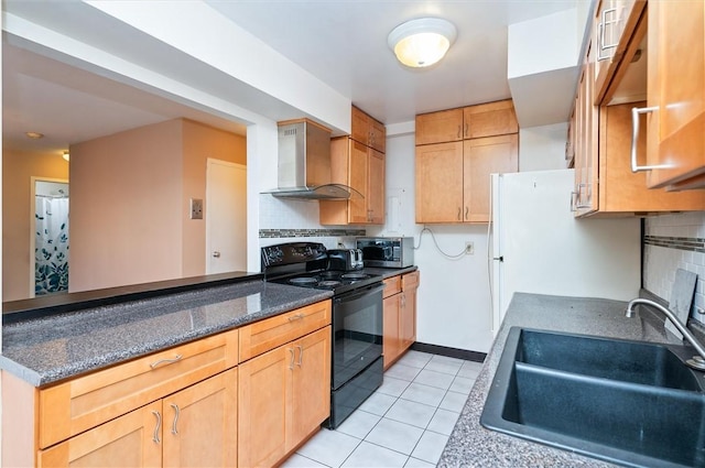 kitchen featuring light tile patterned floors, sink, tasteful backsplash, black range with electric cooktop, and wall chimney exhaust hood