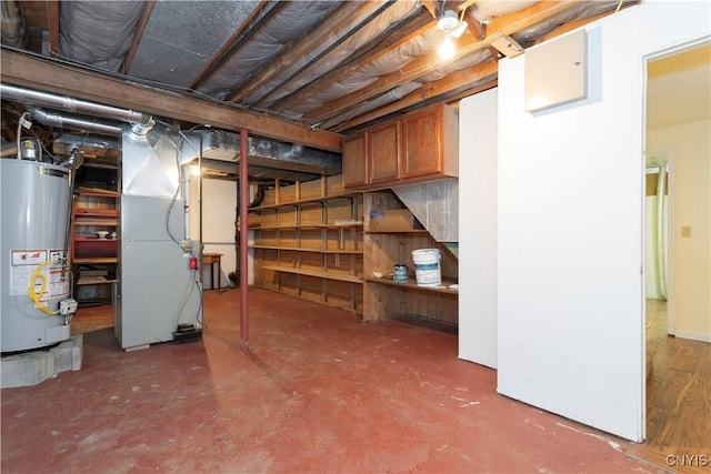 basement with heating unit and gas water heater