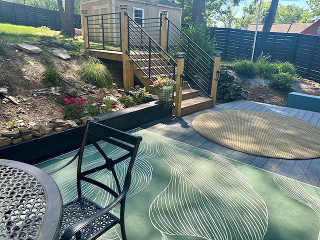 view of patio with a storage unit