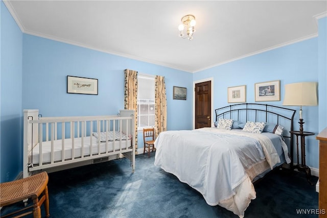 carpeted bedroom with crown molding