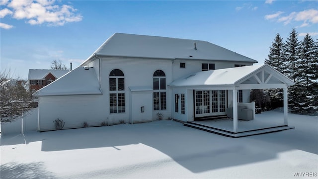 view of snow covered property