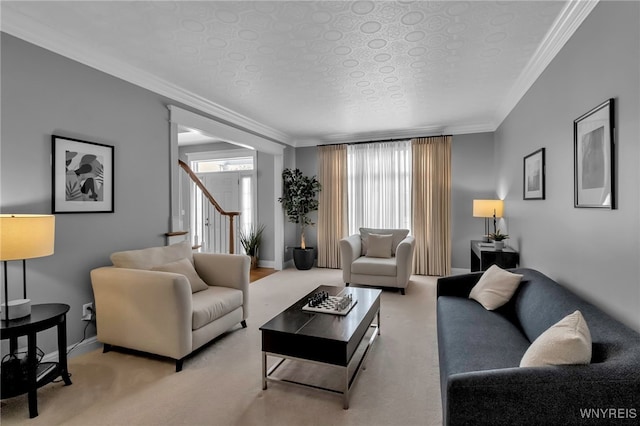 carpeted living room featuring crown molding and a textured ceiling