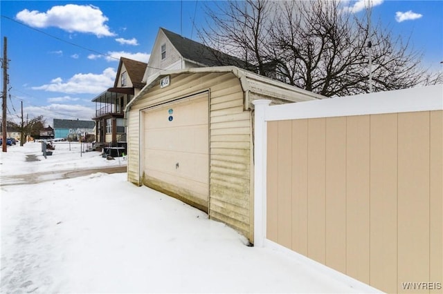 view of snow covered garage