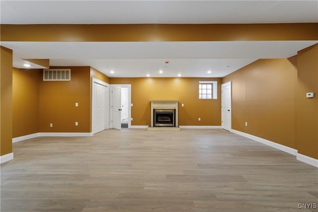 1208 James St, Syracuse, NY 13203 - unfurnished living room with light hardwood / wood-style flooring