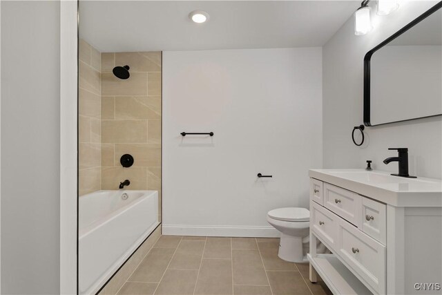 1208 James St, Syracuse, NY 13203 - full bathroom featuring tiled shower / bath, tile patterned floors, toilet, and vanity