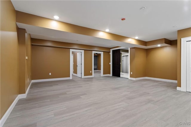 1208 James St, Syracuse, NY 13203 - basement with light hardwood / wood-style floors