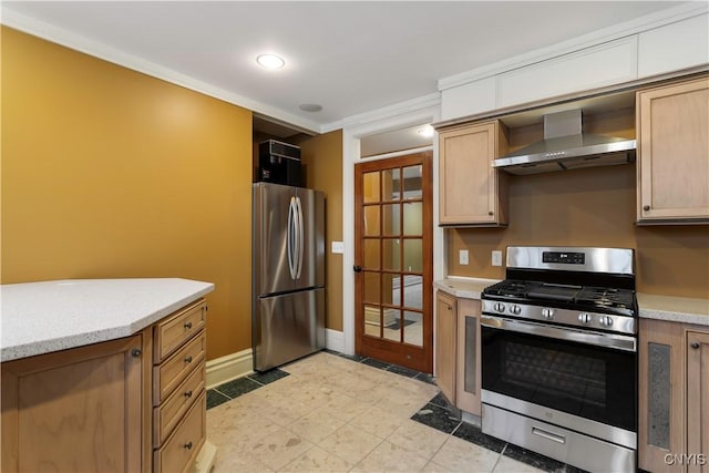 1208 James St, Syracuse, NY 13203 - kitchen featuring stainless steel appliances, light brown cabinets, and wall chimney exhaust hood