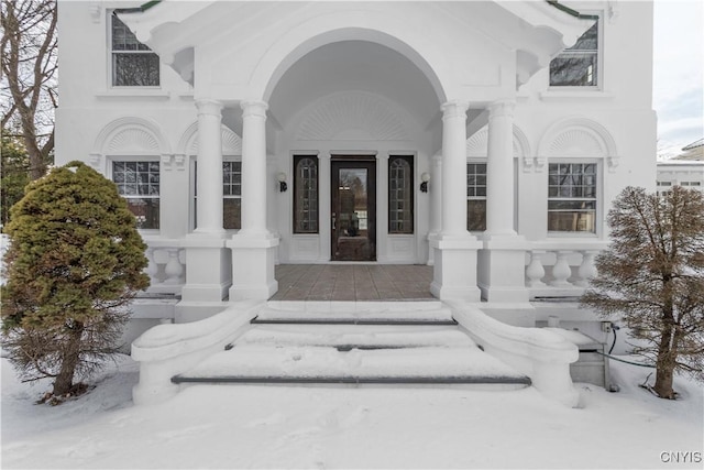 1208 James St, Syracuse, NY 13203 - view of snow covered property entrance