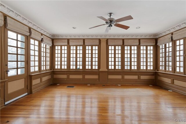 1208 James St, Syracuse, NY 13203 - empty room with ceiling fan and light wood-type flooring