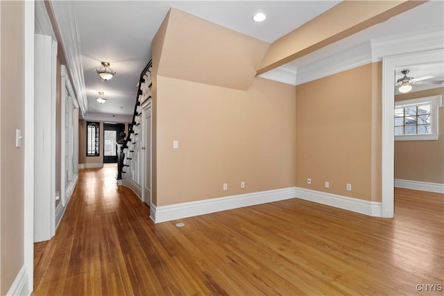 1208 James St, Syracuse, NY 13203 - corridor with hardwood / wood-style flooring, ornamental molding, and a barn door