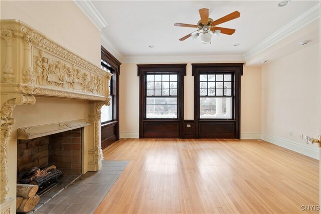 1208 James St, Syracuse, NY 13203 - unfurnished living room with crown molding, ceiling fan, and light hardwood / wood-style floors