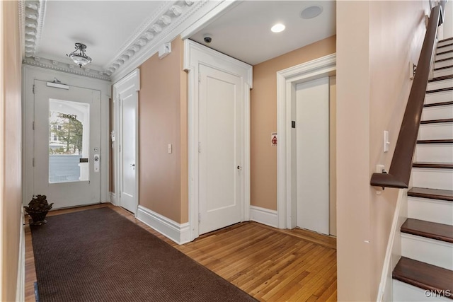 1208 James St, Syracuse, NY 13203 - foyer entrance with hardwood / wood-style flooring
