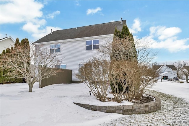 view of snow covered property