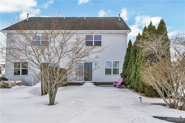 view of snow covered property