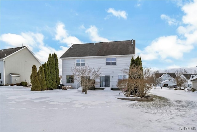 view of snow covered property