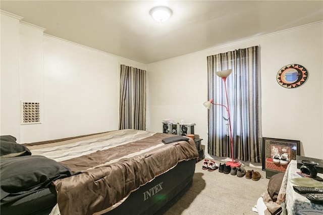 carpeted bedroom featuring ornamental molding