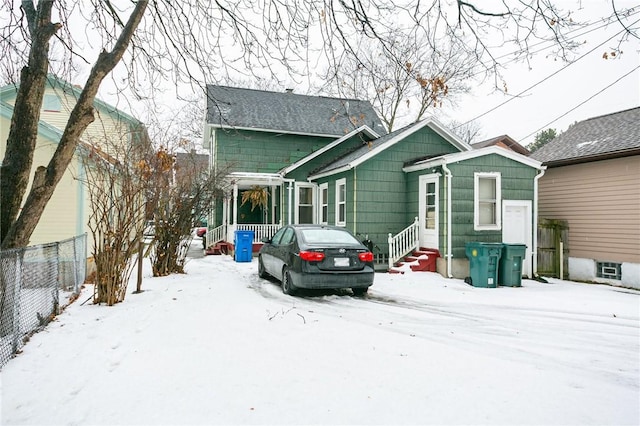 view of snow covered house