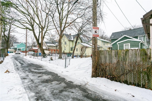 view of yard layered in snow