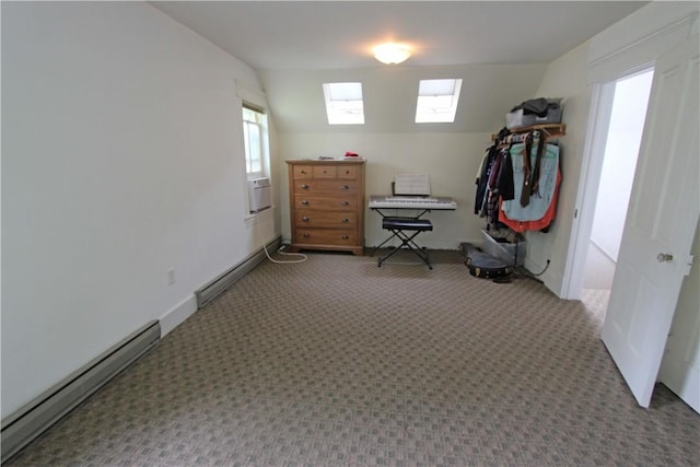 washroom with a skylight, carpet floors, and baseboard heating