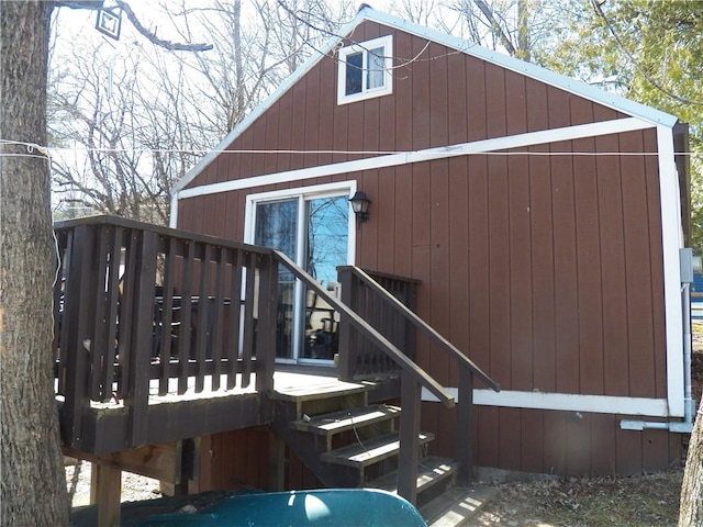 6024 W Willow Pt, Canadice, NY 14471 - rear view of house featuring a deck and stairs