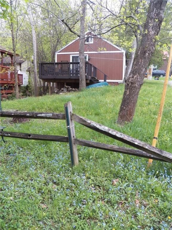 6024 W Willow Pt, Canadice, NY 14471 - view of yard featuring a deck and fence