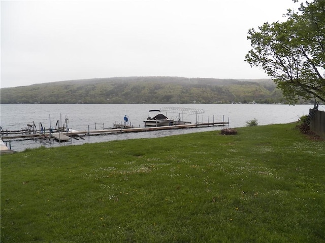 6024 W Willow Pt, Canadice, NY 14471 - dock area featuring a water view and a lawn