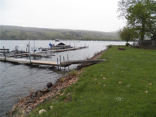 6024 W Willow Pt, Canadice, NY 14471 - dock area featuring a water view, a yard, and a wooded view